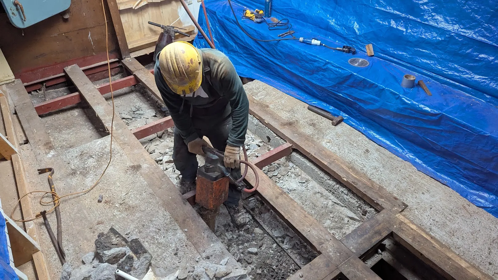 Old concrete and soil ballast being removed from beneath NEPTUN's salon during re-ballasting