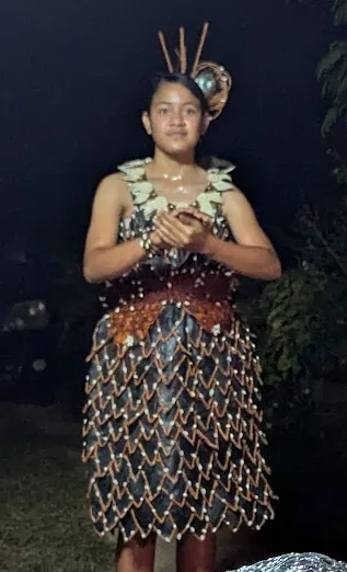 Vai's sisters performing a traditional Tongan dance in dresses made by their grandmother