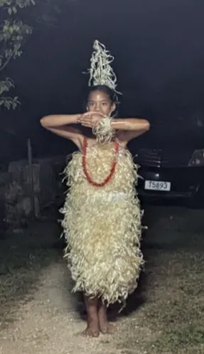Tongan dancers in traditional dress at the family feast hosted by Vai