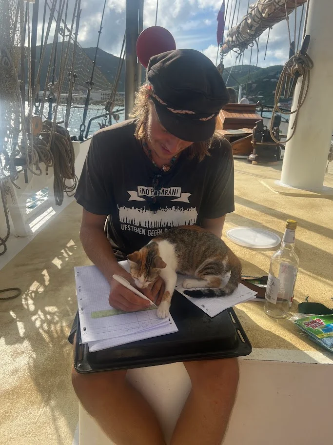 Tall ship sailing and writing