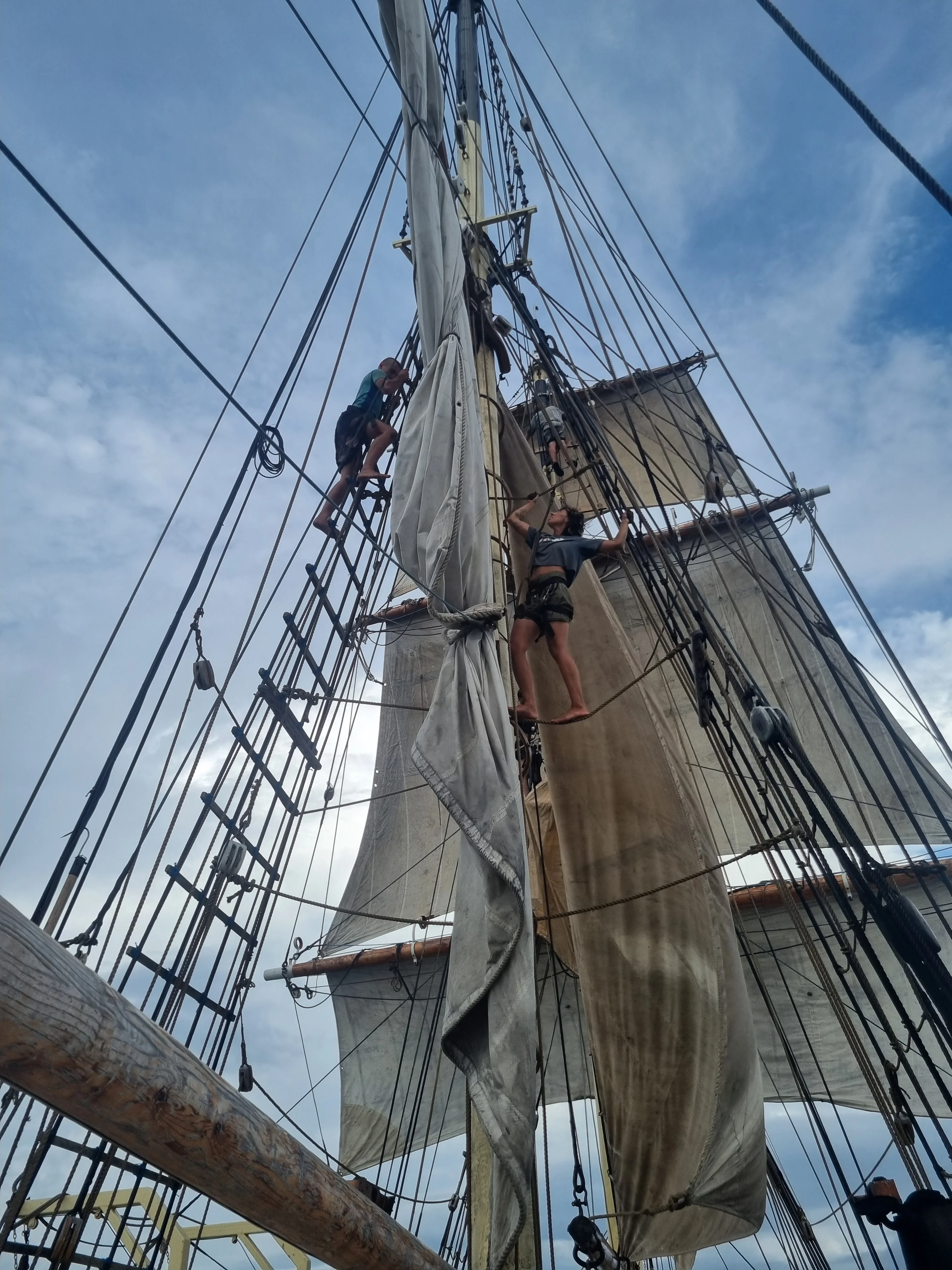 Young trainee crew on deck of Brigantine NEPTUN