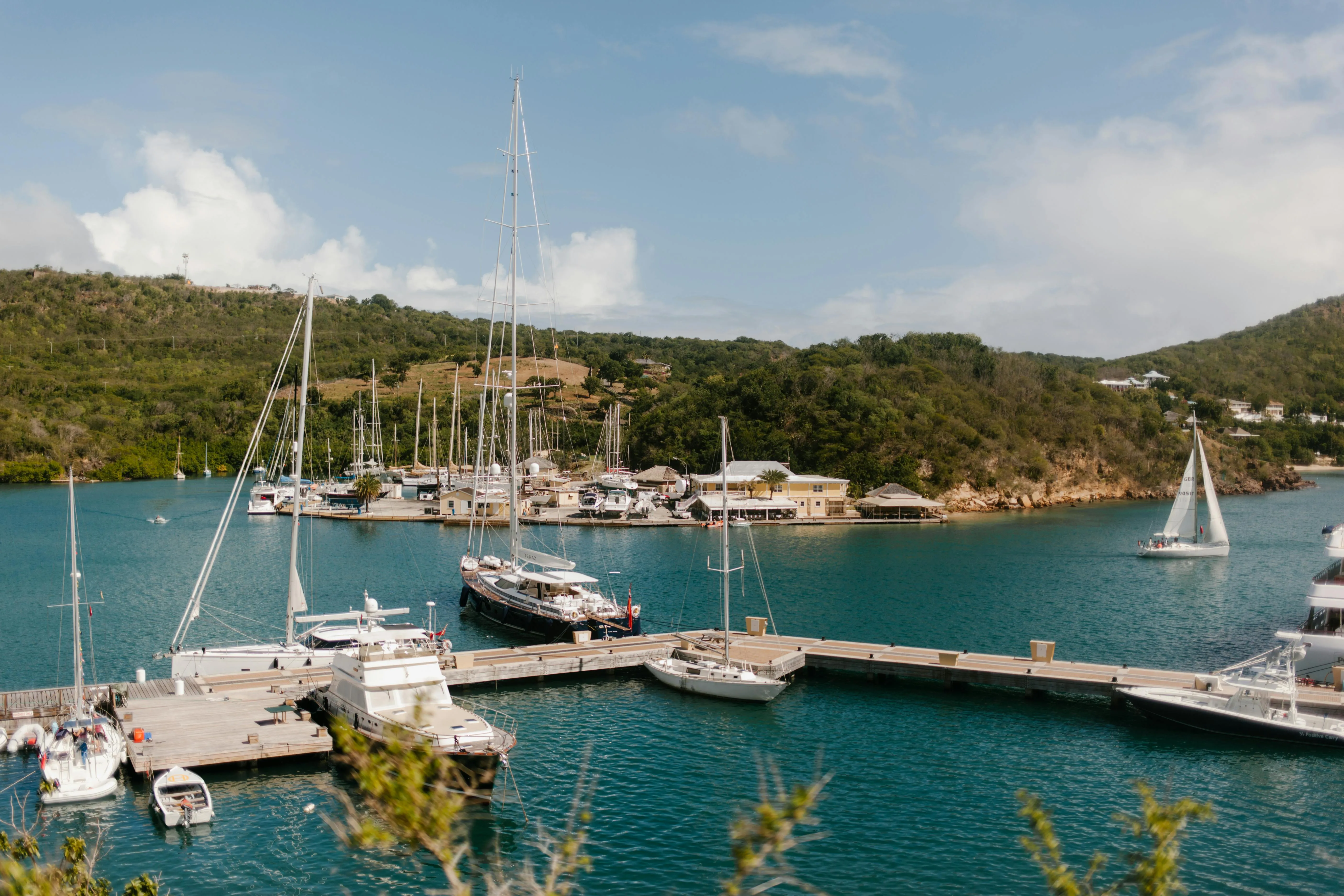 Ships moored in the tranquil inner harbour of Nelson's Dockyard, the end of Leg 7 and the spiritual home of Atlantic tall-ship sailing.