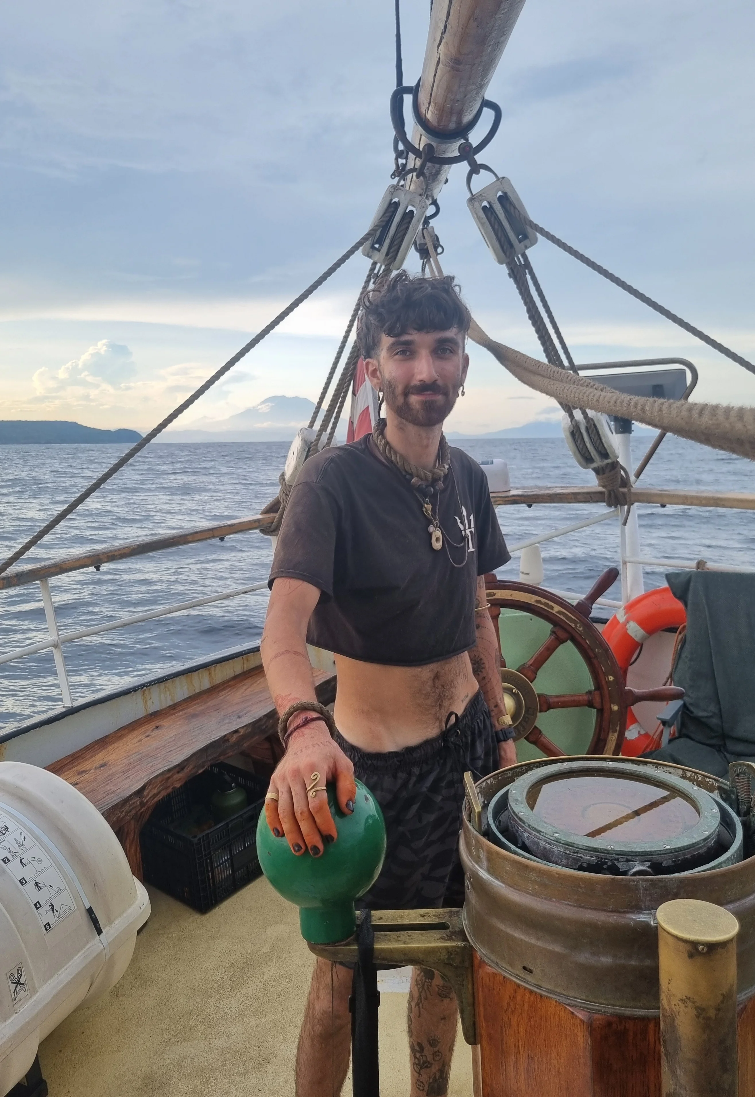 Sailing crew at the helm