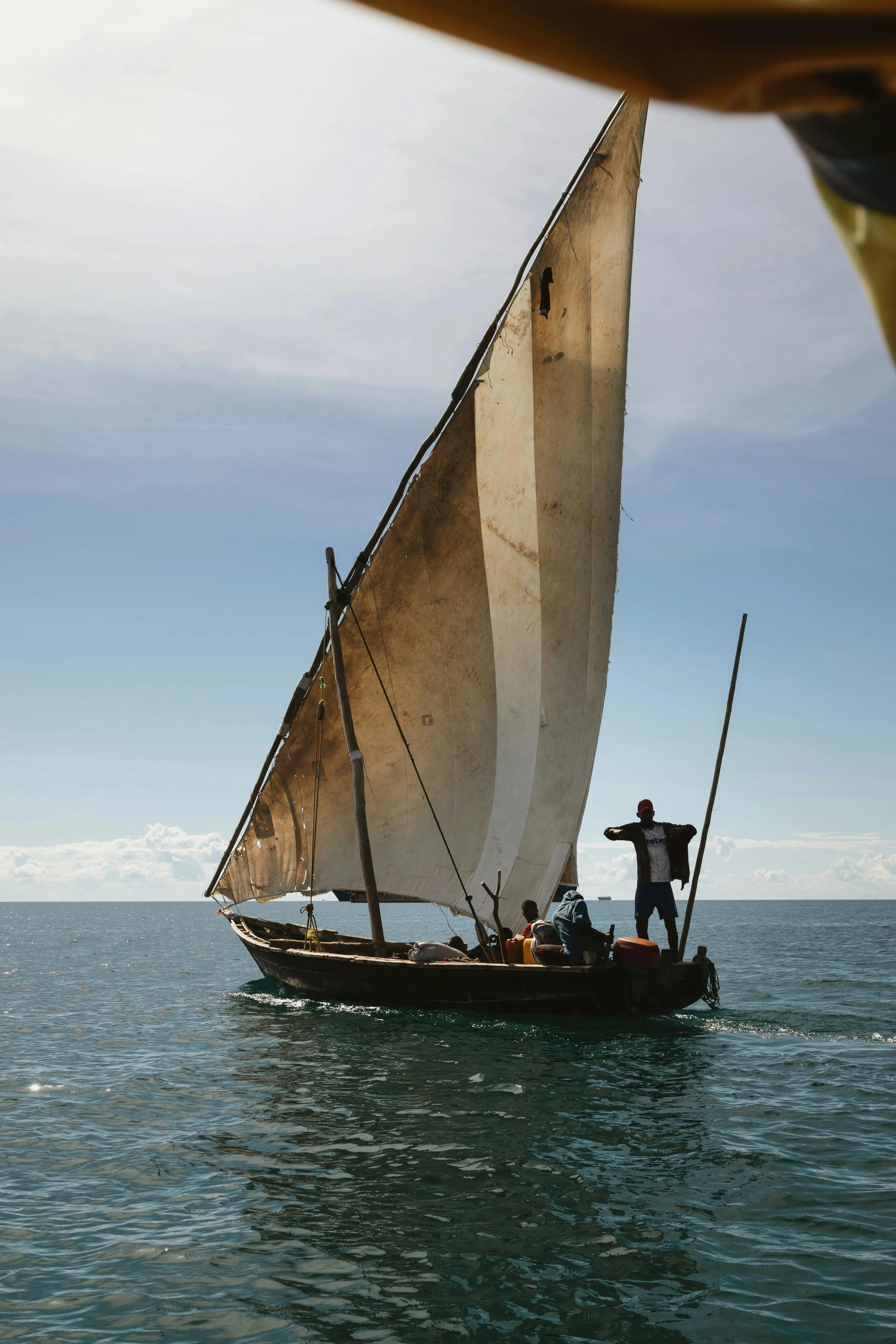 Traditional dhow under sail off the Zanzibar coast.